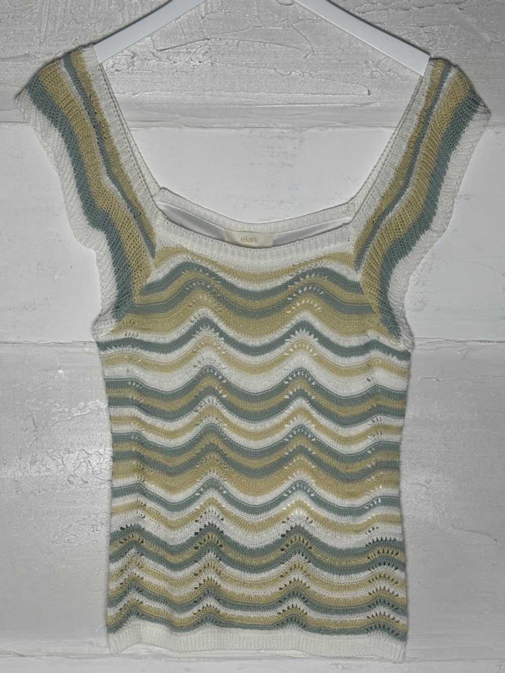 New w tags. Elan zig zag ruffle sleeve top. Lined